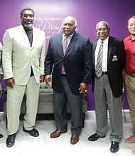 Faith leaders and football/Virginia Union University football team chaplain, the Rev. Joe Ellison, right, gathers with honorees at the 4th Annual Washington Football Team/RVA Faith Leaders Luncheon on Monday at New Kingdom Christian Ministries on Dill Avenue in Highland Park. The luncheon was co-hosted by Rev. Ellison and the church’s senior pastor, Dr. Christopher Moore, left, to honor four Black College Football Hall of Famers. They are, beginning second from left, Virginia Union University Athletic Director Joe Taylor; former Washington Football Team quarterback and Super Bowl MVP Doug Williams, who is now special adviser to the WFT president; Willie E. Lanier, former NFL Kansas City Chiefs player and Pro Football Hall of Famer whose stellar football career started at Maggie L. Walker High School in Richmond; and Coach Willard Bailey, who coached four Virginia teams during an illustrious career at VUU, Norfolk State University, the former St. Paul’s College and Virginia University of Lynchburg. Coach Bailey is the newest inductee in the Black College Football Hall of Fame; he was inducted in June. Joining the group also is the WFT Senior Team Chaplain Bishop Brett Fuller, second from right.