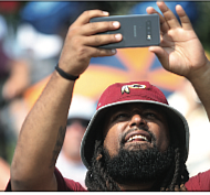 Welcoming the burgundy and gold/There’s no doubt that the Washington Football Team has real diehard fans in Richmond. After a year’s hiatus because of COVID-19, the NFL team received a big welcome back to its Richmond training camp on Wednesday by fans who turned out in droves.  Many wore the team colors of burgundy and gold. A fan records the field action on his cell phone.