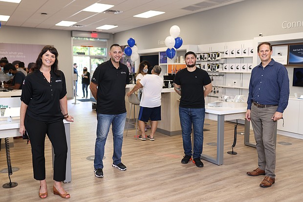Comcast Officials Pictured (L-R) Kate Inman, Director of Indirect Sales; Christopher Jones, Manager of Indirect Sales; Victor Menchaca, Wallisville Store Manager; and Demian Voiles, Vice President of Sales and Marketing, Comcast Houston