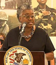 Karen Davis, deputy director of the Illinois Housing Development Authority, speaks at a bill signing event for a measure increasing tax incentives for building affordable housing in Illinois. She said 250,000 affordable housing units are needed in Illinois to meet demand. Credit: Blueroomstream.com
