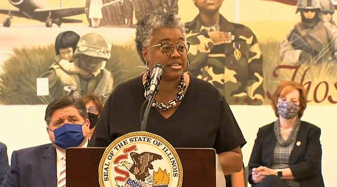 Karen Davis, deputy director of the Illinois Housing Development Authority, speaks at a bill signing event for a measure increasing tax incentives for building affordable housing in Illinois. She said 250,000 affordable housing units are needed in Illinois to meet demand. Credit: Blueroomstream.com