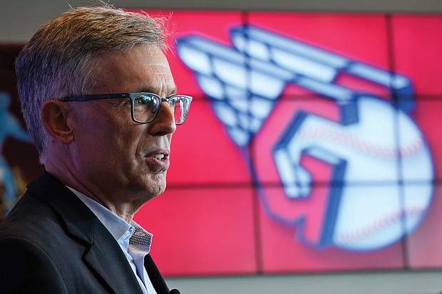 Cleveland baseball team owner Paul Dolan speaks to the media July 23 as the new Cleveland Guardians logo is displayed.