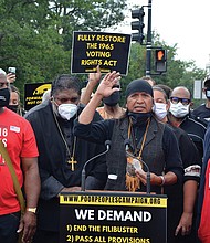 Wendsler Nosie, an Apache activist, speaks Monday during the Poor People’s Campaign demonstration in Washington.