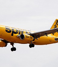 Spirit Airlines -- which has been beset by flight disruptions all week -- canceled almost 300 flights as midday Friday.
Mandatory Credit:	Jim Watson/AFP/AFP/Getty Images