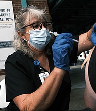 Covid-19 infections of vaccinated people are expected. But the unvaccinated are 'the big highway of transmission,' experts say.
Mandatory Credit:	Spencer Platt/Getty Images