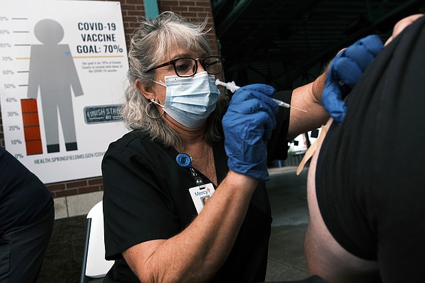 Covid-19 infections of vaccinated people are expected. But the unvaccinated are 'the big highway of transmission,' experts say.
Mandatory Credit:	Spencer Platt/Getty Images