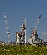 An ExxonMobil petrochemical complex under construction in Texas in July. Lawmakers are urging action on climate change this week after a UN report concluded greenhouse gas emissions need to be cut significantly, and fast, in order to avoid the worse impacts.
Mandatory Credit:	Eddie Seal/Bloomberg/Getty Images