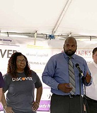 Illinois State Senator Elgie Sims speaks during Cradles to Crayons’ Ready for Learning event at Discover Customer Care Center, where volunteers packed 12,000 backpacks. Photo by Tia Carol Jones