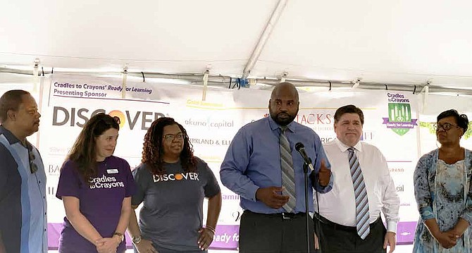 Illinois State Senator Elgie Sims speaks during Cradles to Crayons’ Ready for Learning event at Discover Customer Care Center, where volunteers packed 12,000 backpacks. Photo by Tia Carol Jones