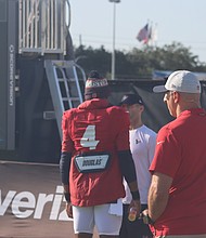 Watson talks with GM Nick Caserio