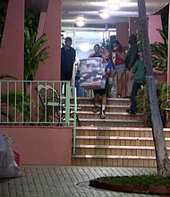 Residents evacuate a building in Miami's Flagami neighborhood.
Mandatory Credit:	WFOR