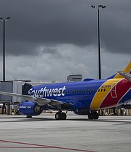 The Delta variant of Covid-19 is weighing on Southwest Airlines' bottom line. The carrier said in a regulatory filing on Aug. 11 that customers this months have been booking fewer flights and are increasingly canceling the trips they've already booked.
Mandatory Credit:	Eva Marie Uzcategui/Bloomberg/Getty Images