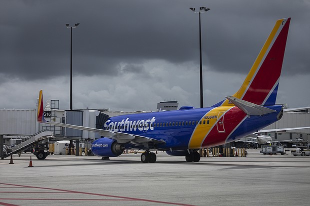 The Delta variant of Covid-19 is weighing on Southwest Airlines' bottom line. The carrier said in a regulatory filing on Aug. 11 that customers this months have been booking fewer flights and are increasingly canceling the trips they've already booked.
Mandatory Credit:	Eva Marie Uzcategui/Bloomberg/Getty Images