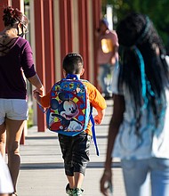 Parents of Tice Elementary School students drop their kids off for the first day of school in Fort Myers, Florida, on August 10.
Mandatory Credit:	Amanda Inscore/The News-Press/USA Today Network