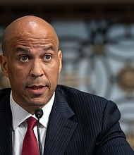 Hours into the Senate's marathon overnight vote-a-rama, Sen. Tommy Tuberville wanted to send a message. Sen. Cory Booker, a New Jersey Democrat, responded with a sarcastic speech from the Senate floor.
Mandatory Credit:	Stefani Reynolds/Pool/Getty Images