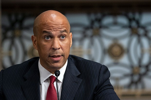 Hours into the Senate's marathon overnight vote-a-rama, Sen. Tommy Tuberville wanted to send a message. Sen. Cory Booker, a New Jersey Democrat, responded with a sarcastic speech from the Senate floor.
Mandatory Credit:	Stefani Reynolds/Pool/Getty Images