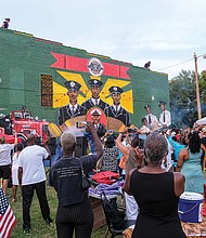 Scores of people turned out Aug. 6 for the official unveiling of the mural honoring the first Black firefighters hired by the City of Richmond. The 10 trailblazers were hired July 1, 1950, and were stationed at Engine Company No. 9 at 5th and Duval streets in Jackson Ward. The commemorative mural was done by local artists Sir James Thornhill, Jason Ford and Kevin Orlosky, and is situated on the side of the Mocha Temple No. 7 Shrine building at 613 N. 2nd St. in Jackson Ward. The unveiling was the kickoff of a weekend of activities sponsored by Engine Company #9 and Associates remembering and honoring the original firefighters.