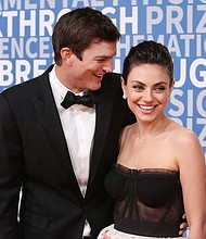 The Kunis-Kutcher kids took a shower, you guys. We know that thanks to a funny video Ashton Kutcher posted on his verified Instagram account of wife Mila Kunis standing in the bathroom as their children were cleaning up.
Mandatory Credit:	Jesse Grant/Getty Images