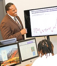Dr. Noah Nicholson II, President of The ARK and Pastor of The Family Worship Center, as well as President/CEO of Global Investments, teaches the children about Stock Investing and Leadership
Development. Photos by Nicole Ashley Gee