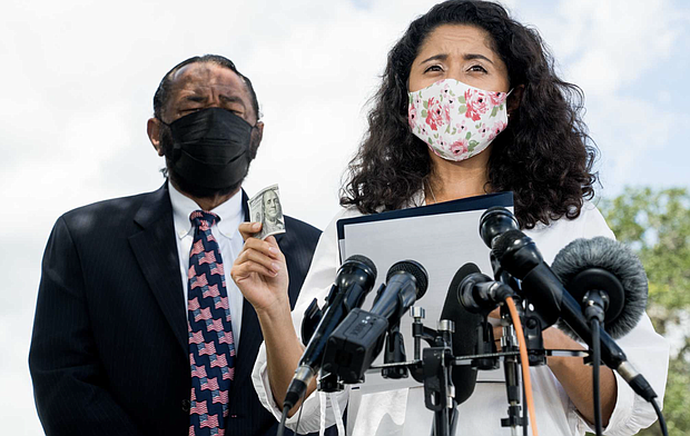 Harris County Judge Lina Hidalgo with U.S. Rep. Al Green (left)