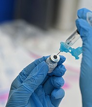 The US Food and Drug Administration could grant full approval to Pfizer/BioNTech's Covid-19 vaccine today.
Mandatory Credit:	Robyn Beck/AFP/Getty Images