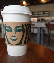 Starbucks is bringing back the Pumpkin Spice Latte on Tuesday. A Starbucks coffee cup sits on a table on June 11, in Miami, Florida.
Mandatory Credit:	Joe Raedle/Getty Images