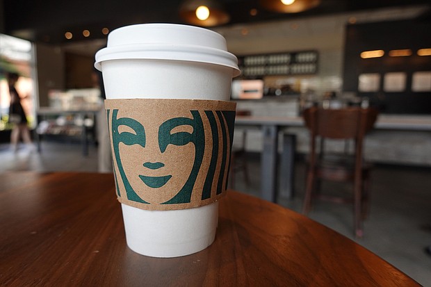 Starbucks is bringing back the Pumpkin Spice Latte on Tuesday. A Starbucks coffee cup sits on a table on June 11, in Miami, Florida.
Mandatory Credit: Joe Raedle/Getty Images