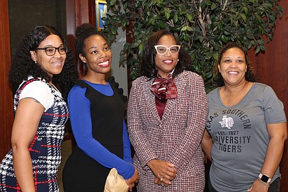 Dr. Young (center) poses with TSU staffers during the “Meet and Greet".

Photo by Andrew McCray