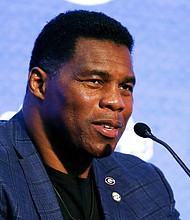Former football star Herschel Walker announced his campaign for US Senate in Georgia on Wednesday. Walker is seen here In this July 16, 2019 file photo, in Hoover, Alabama.
Mandatory Credit:	Butch Dill/AP