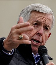 According to US law enforcement, US Marshals preparing to arrest a fugitive allegedly involved in drug trafficking in Missouri faced last-minute hurdles because of a controversial new state law, signed by Missouri Gov. Mike Parson aimed at protecting gun rights.
Mandatory Credit:	Charlie Riedel/AP