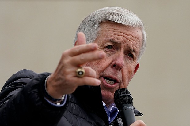 According to US law enforcement, US Marshals preparing to arrest a fugitive allegedly involved in drug trafficking in Missouri faced last-minute hurdles because of a controversial new state law, signed by Missouri Gov. Mike Parson aimed at protecting gun rights.
Mandatory Credit:	Charlie Riedel/AP
