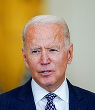 President Joe Biden was attending a pre-scheduled meeting of his national security team at the White House when reports of the Kabul Airport attack reached Washington.
Mandatory Credit:	Manuel Balce Ceneta/AP