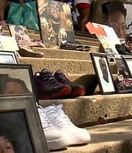 A memorial at the August 29 Mothers of Murdered Sons and Daughters event in Louisville shows some of the victims of violence.
Mandatory Credit:	WLKY