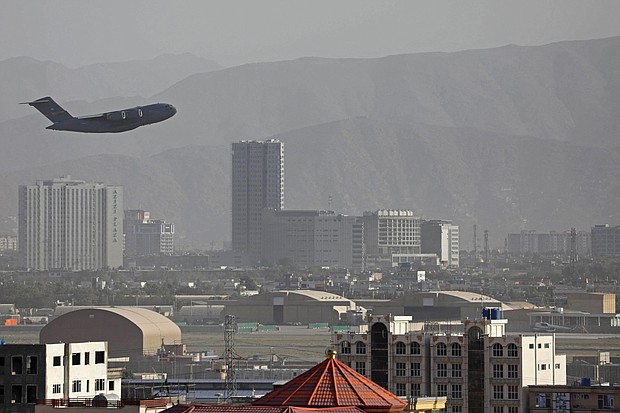 A US Air Force aircraft takes off from the military airport in Kabul on August 27, as the Pentagon said the evacuation of tens of thousands of people from Afghanistan still faces more possible attacks like the bombing that killed scores of people outside the Kabul airport.
Mandatory Credit: AFP/Getty Images