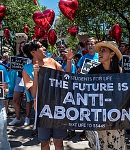 Texas 6-week abortion ban lets private citizens sue abortion providers in an unprecedented legal approach. Abortion protesters here stand outside the Texas state capitol on May 29, in Austin, Texas.
Mandatory Credit:	Sergio Flores/Getty Images