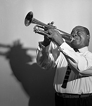 When Hurricane Ida hit New Orleans on August 29, the storm destroyed the building that housed the Karnofsky Tailor Shop, run by a family of Jewish immigrants, who had a warm relationship with jazz icon Louis Armstrong, pictured here on August 30, 1954.
Mandatory Credit:	CBS Photo Archive/Getty Images