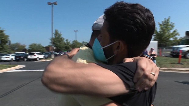 As an interpreter for US forces in Afghanistan, Mohammed Iqbal Selanee, left, worked alongside Josh Rodriguez when he was deployed to Kunar Province, helping countless US soldiers, and this embrace was years in the making.
Mandatory Credit: CNN