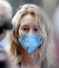 Elizabeth Holmes, founder and CEO of Theranos, arrives at the federal courthouse for jury selection in her trial,  on August 31, in San Jose, California.
Mandatory Credit:	Nic Coury/AP