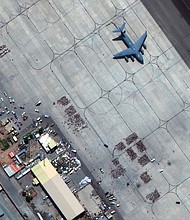 Taliban members escorted Americans who sought to escape Afghanistan to gates at Kabul airport as part of a secret arrangement with the United States. Pictured is Kabul airport on August 23.
Mandatory Credit:	Satellite image ©2021 Maxar Tec/AP