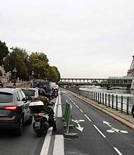 Authorities in the French capital of Paris are forcing drivers to slow down in a bid to reduce pollution and improve road safety. Pictured is the Seine River in Paris.
Mandatory Credit:	Ludovic Marin/AFP/Getty Images