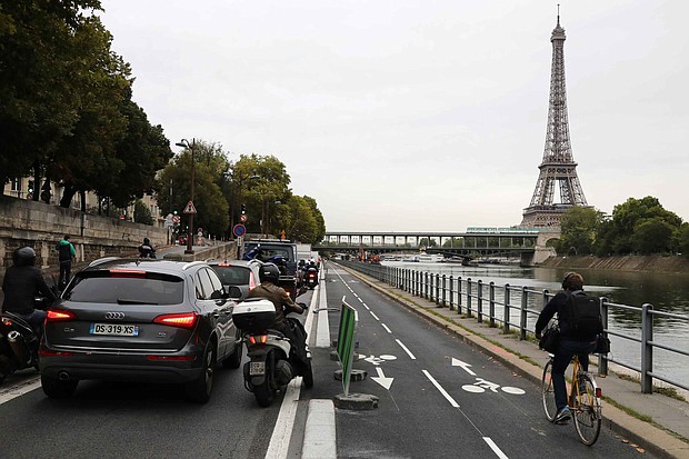 Authorities in the French capital of Paris are forcing drivers to slow down in a bid to reduce pollution and improve road safety. Pictured is the Seine River in Paris.
Mandatory Credit: Ludovic Marin/AFP/Getty Images