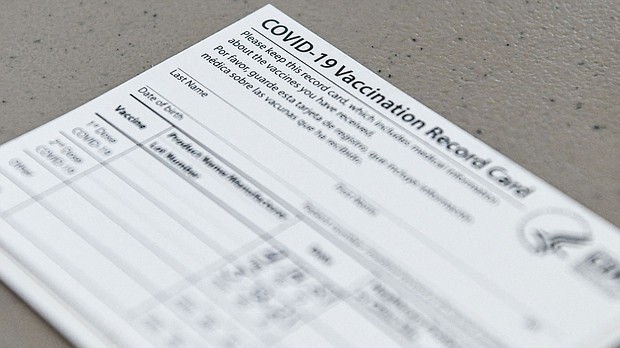 The office of Manhattan District Attorney Cyrus R. Vance Jr. says fifteen people are facing charges connected to a fake Covid-19 vaccination card conspiracy involving the sale of forged cards, and the fraudulent entry of people into New York's vaccination database.
Mandatory Credit:	CHANDAN KHANNA/AFP via Getty Images