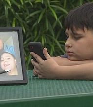 Jayden, 8, had a close relationship with his father Sam Casas, who was killed during an attempted robbery.
Mandatory Credit:	KPHO/KTVK