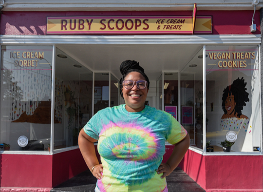 Ms. Kamara stands outside of Ruby Scoops, her ice cream shop on Brookland Park Boulevard on North Side, where she serves a variety of her ice cream and sorbet creations. Her ultimate goal is to open more locations.