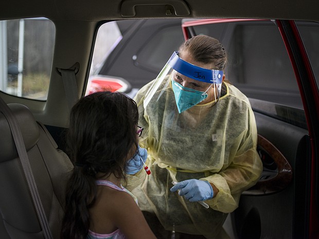 More than 500,000 children tested positive for Covid-19 in 3 weeks. Experts say school mask mandates are needed. Pictured is a drive-thru vaccination and testing site in Austin, Texas, on August 5.
Mandatory Credit:	Matthew Busch/BloombergGetty Images