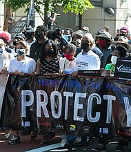 Congresswoman Sheila Jackson Lee and Congresswoman Terri A. Sewell with others at March On Washington