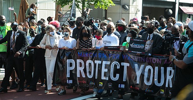 Congresswoman Sheila Jackson Lee and Congresswoman Terri A. Sewell with others at March On Washington