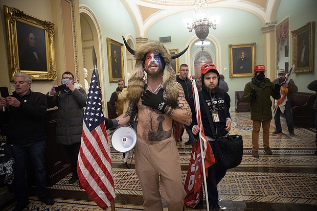 Jacob Chansley, the so-called "QAnon Shaman," who stormed the US Capitol in a horned bearskin outfit pleaded guilty Sept. 3 to a felony for obstructing the Electoral College proceedings on January 6.
Mandatory Credit:	Win McNamee/Getty Images