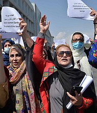 Afghan women take part in a demonstration for their rights in Kabul on Sept. 3.
Mandatory Credit:	HOSHANG HASHIMI/AFP/Getty Images