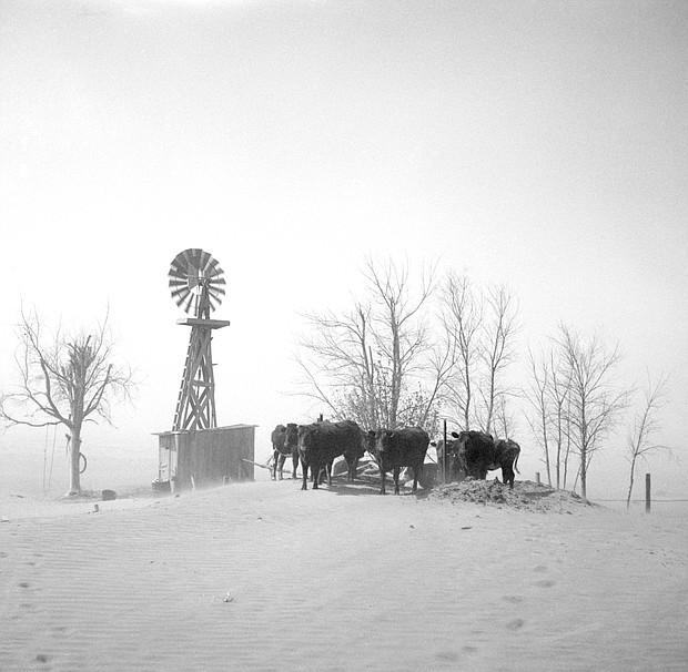 A livestock watering hole almost completely covered by shifting topsoil, in Cimarron County, Oklahoma, in the Dust Bowl year of 1936.
Mandatory Credit:	Universal History Archive/Universal Images Group/Getty Images